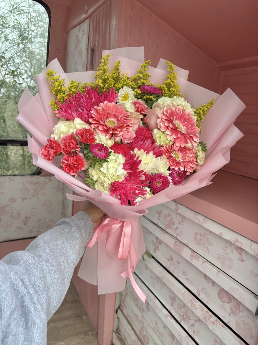 Bright pink bouquet tied with a bow